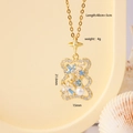 Golden bear pendant necklace with white and blue zircon and a pearl drop on gold chain - Bear Gold (2799)