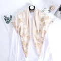 Floral print square silk scarf in champagne with daisy pattern for elegant styling - Floral Milk Tea Color