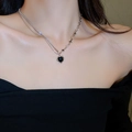 Close-up of double-layer silver chain featuring a black heart pendant and sparkling rhinestones - 33# Necklace - Black Heart Gemstone Double Layer - Silver