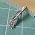 Elegant silver feather hair clip adorned with sparkling crystals and rhinestones - Silver Feather Duckbill Clip
