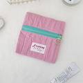 Detail of pink wrinkled makeup bag with blue contrast zipper and green pull ring - Double Layer Polyester Pink