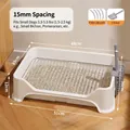 White high-sided dog toilet with stainless steel grid and grey scooper accessory - 15mm Grid White