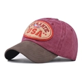 Dettaglio cappellino vintage USA in cotone lavato con ricamo e trama invecchiata - Rosso Vino USA