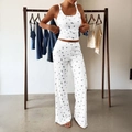 Dames yogaset met witte tanktop en wijde broek voorzien van blauwe bloemenpatronen - S / Wit