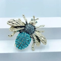 Cute bee brooch pin with golden metal wings and vibrant sky blue rhinestones inlay - Style 33