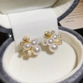 Detailed close-up of gold-plated flower pearl earrings with sparkling zircons on velvet - Gold (18K Gold Plated S925 Silver Pin)