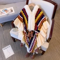 Colorful knitted poncho shawl with faux fur collar and tassels in vintage wave patterns - Yellow
