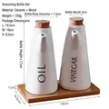 Minimalist white ceramic oil and vinegar dispenser set with natural wooden base stand - Set of 2 Seasoning Bottles