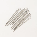 Macro shot of silver flat head T-pins for DIY jewelry making and handmade beading - Platinum/White Gold Flat Head Pin