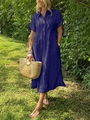Detailaufnahme der blau-weiß gestreiften Baumwoll-Leinen-Hemdbluse mit Seitentaschen - Marineblau