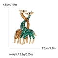 Golden giraffe enamel brooch with green and orange finish, 4.8cm x 3.2cm size - Green