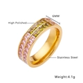Detail of 6mm polished stainless steel ring featuring double-row pink and green zircons - Gold / US 6