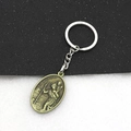Vintage St. Christopher metalen sleutelhanger met bronzen ovale hanger en gravering - Retro Brons