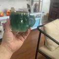 Artistic emerald green faceted mineral crystal mug with thick rounded resin handle - Green