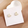 Elegant s925 silver heart stud earrings in cream white and gold finish for women - White