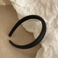 Minimalist black faux leather sponge headband with elegant litchi texture and wide design - Black