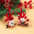 Christmas hair clips featuring red reindeer antlers and white bear with festive bows - Christmas Clip Style 10