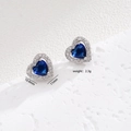 Blue heart zircon stud earrings with silver plating and surrounding clear stones - Stud Earrings / Blue