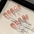 Handmade press-on nails with nude pink gradient, 3D butterfly charms and rhinestones - XS / Slender Stiletto