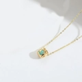 Elegant gold money bag pendant necklace featuring a vibrant blue dollar sign decoration - Blue