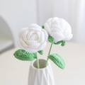 Handmade crochet bouquet with two white knitted roses and green leaves in a small vase - Rose White