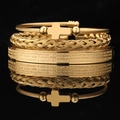 Three-piece set of gold stainless steel bracelets with Roman numerals and cross pendant - Gold Cross Bangle 3-Piece Set