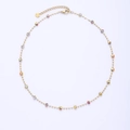 Detailed shot of gold plated chain necklace featuring colorful faceted beads and square spacers - Colorful Facetted Beads