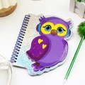 Close-up of cute purple cartoon owl coil notebook with laser glitter sequin cover - Owl