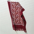 Detail of wine red faux cashmere shawl with floral embroidery and tassel fringe - Jujube Red 450g