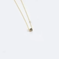 Chic black cube pendant necklace with golden letter H on a delicate fine chain - Letter H