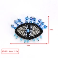Detailed evil eye brooch embroidery with blue beads and crystals, dimensions 65x50mm - Black Base Silver Blue Beaded Eye-BE1503BU00