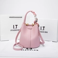 Pink lychee grain leather bucket bag with silk scarf handle and golden hardware details - Romantic Pink