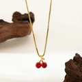 Exquisite gold cherry pendant necklace with red beads and sparkling zircon leaf detail - Small Cherry Necklace Gold