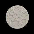 Round silicone mold with 11 different sized maple leaves for DIY baking and clay craft - Gray