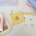 Detail of yellow checkered storage bag with apple embroidery and wristlet strap - Yellow Gingham Apple Embroidery