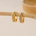 Macro shot of gold huggie earrings with three clustered zircon floral designs on a stand - EH410032-Gold Flower Clusters