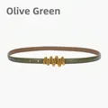 Slim grass green genuine leather belt for women featuring a wavy gold metal buckle - Veggie Green