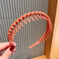 Orange matte wavy headband with non-slip teeth for secure styling and hair holding - Orange