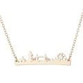 Close-up of golden London skyline pendant with Tower Bridge and London Eye detail - 619 City Skyline / Gold