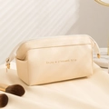 Creamy white PU cloud makeup bag with gold zipper and Enjoy a pleasant trip print - Beige