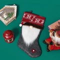 Grey Christmas stocking with white beard gnome design and red snowflake knit patterns - Gray