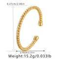 Detail showing 18K gold-plated twisted open bangle dimensions 6.27cm height and weight - Spiral Twist