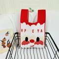 Knitted festive red and white handbag featuring Happy New Year text and smiley face - HAPPY NEW YEAR