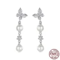 Elegant s925 sterling silver butterfly earrings with white pearls and sparkling cubic zirconia - 925 Silver / Butterfly Stud Earrings (BSE1130)