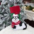Christmas stocking with husky cartoon design on cozy holiday fireplace background - Christmas Dog Stocking