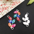Silver leaf-shaped charms with evil eye enamel details in various vibrant colors - Bright Silver Evil Eye 12x45mm