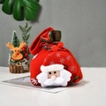 Christmas gift bag with 3D Santa Claus figure and white snowflake drawstring design - Green Border Christmas Santa Bag