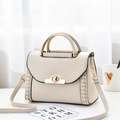 Chic off-white handbag with gold metal handle and woven side details for women - Khaki