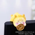 Mini yellow resin dragon figurine holding a gold coin for computer monitors and cars - 3.2x3.8x3.1CM / Type C Lucky Coin Dragon