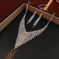 Parure collier et boucles d'oreilles à pompons argentés avec cristaux scintillants - Style Gland en Zircon Plaqué Argent